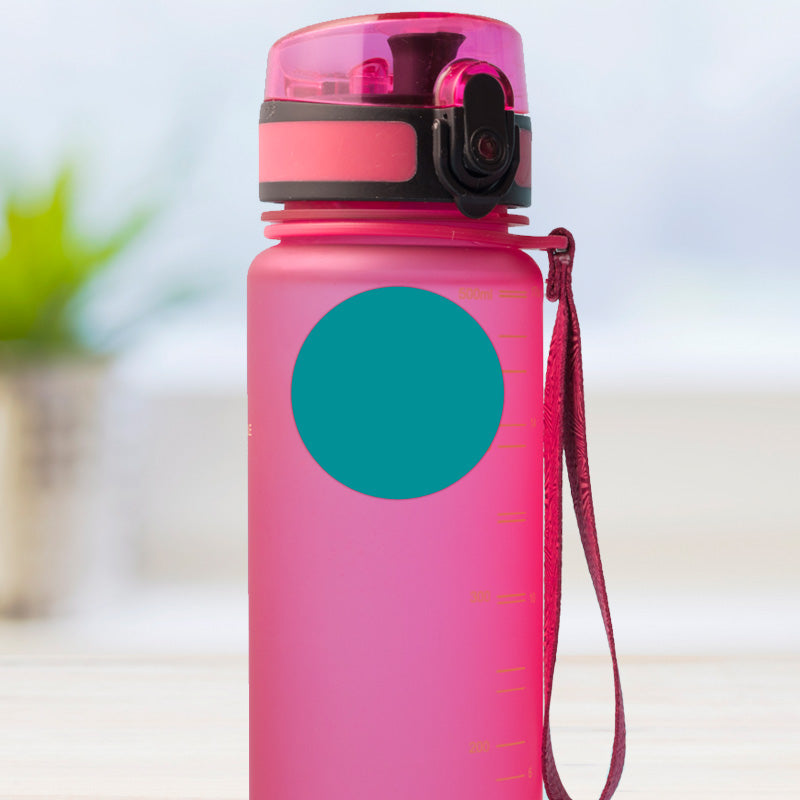 White design medium round stick on name label applied to a reusable water bottle