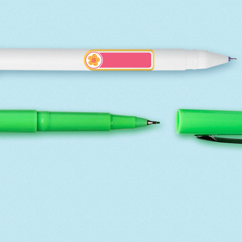Flower design mini rectangle name label applied to a pen