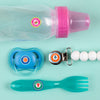 Mini round name labels applied to a baby bottle, pacifier , child proof fork