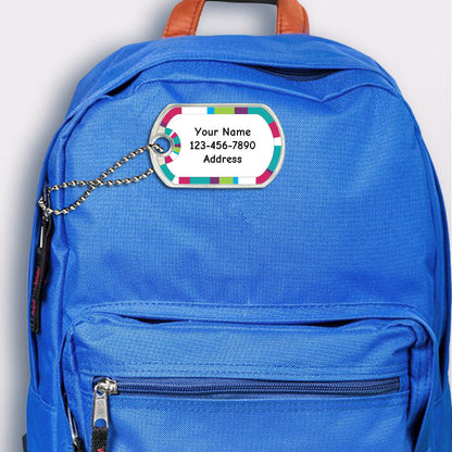 Pink Stripes design bag tag attached to backpack
