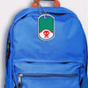 Crossbones design bag tag attached to backpack