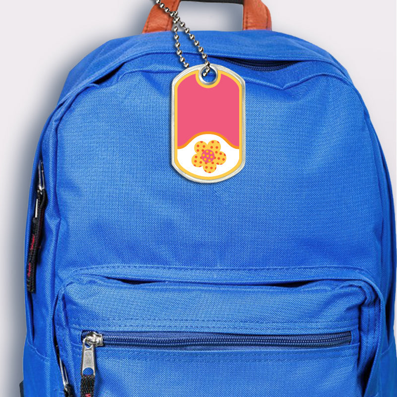 Flower design bag tag attached to backpack