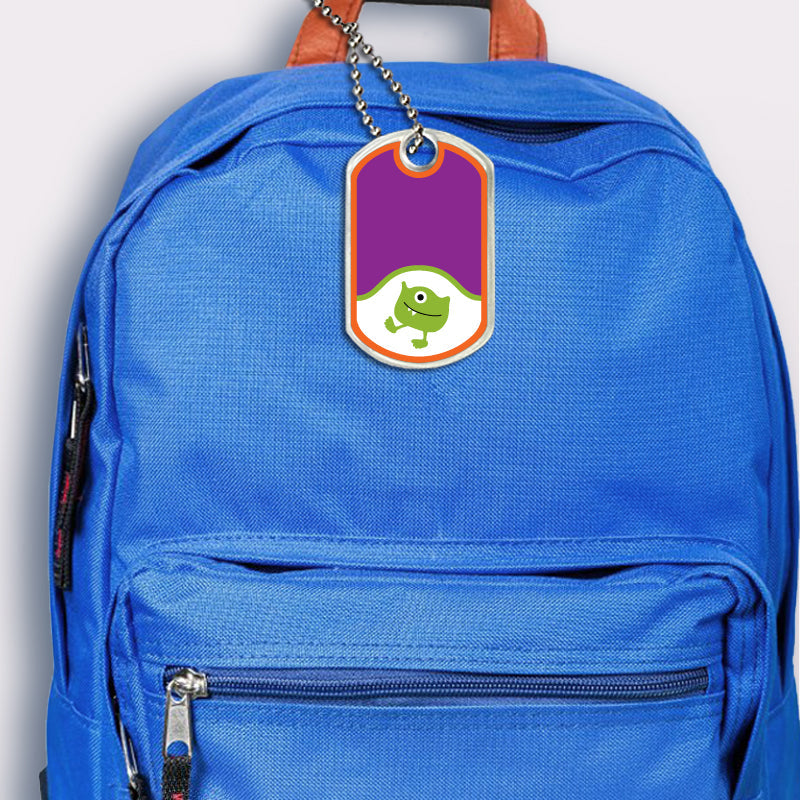 Monster design bag tag attached to backpack