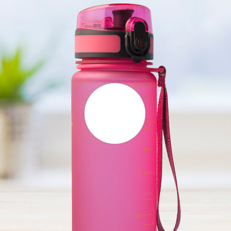 White design medium round stick on name label applied to a reusable water bottle
