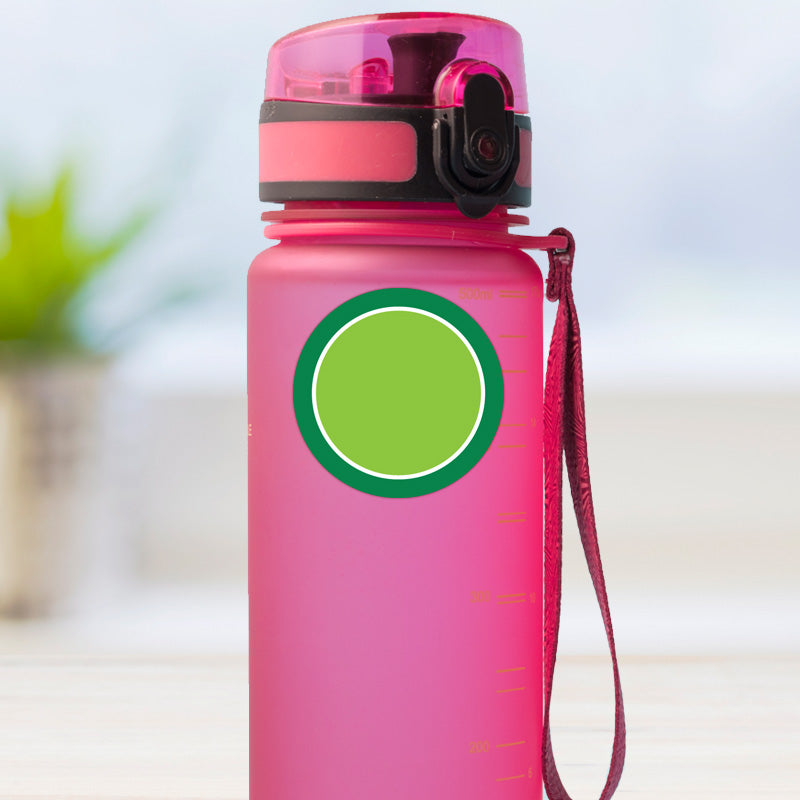 Forest design medium round stick on name label applied to a reusable water bottle