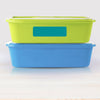 Teal design name label applied to a Tupperware food container